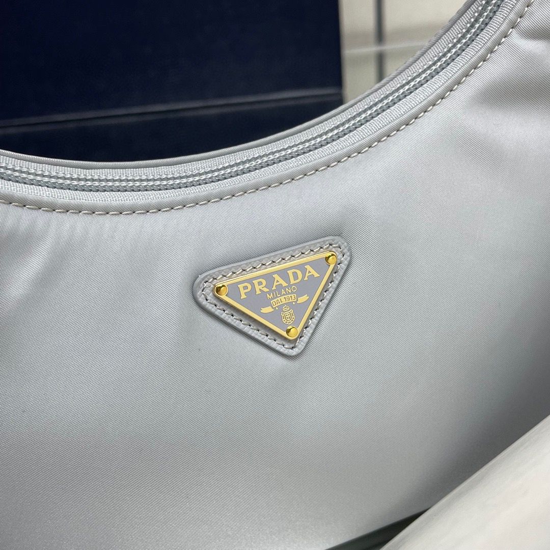 Bolsa Prada mini Re-Edition 2000