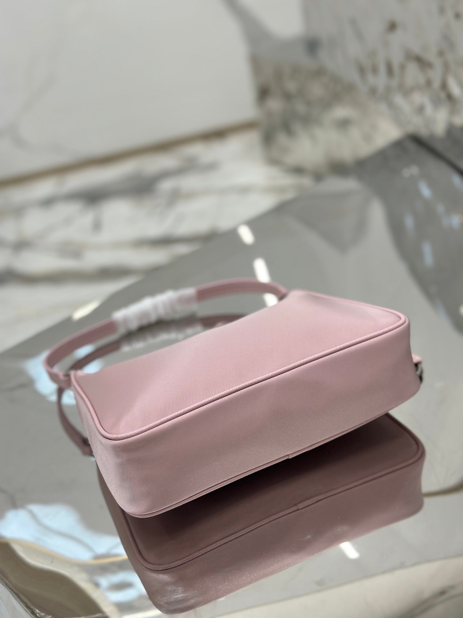 Bolsa Prada mini Re-Edition 2000