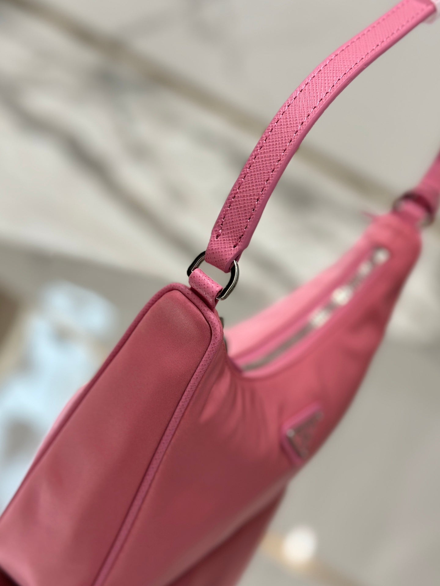 Bolsa Prada mini Re-Edition 2000