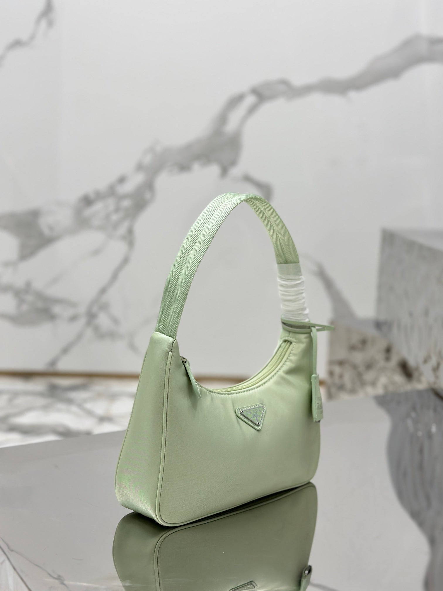 Bolsa Prada mini Re-Edition 2000